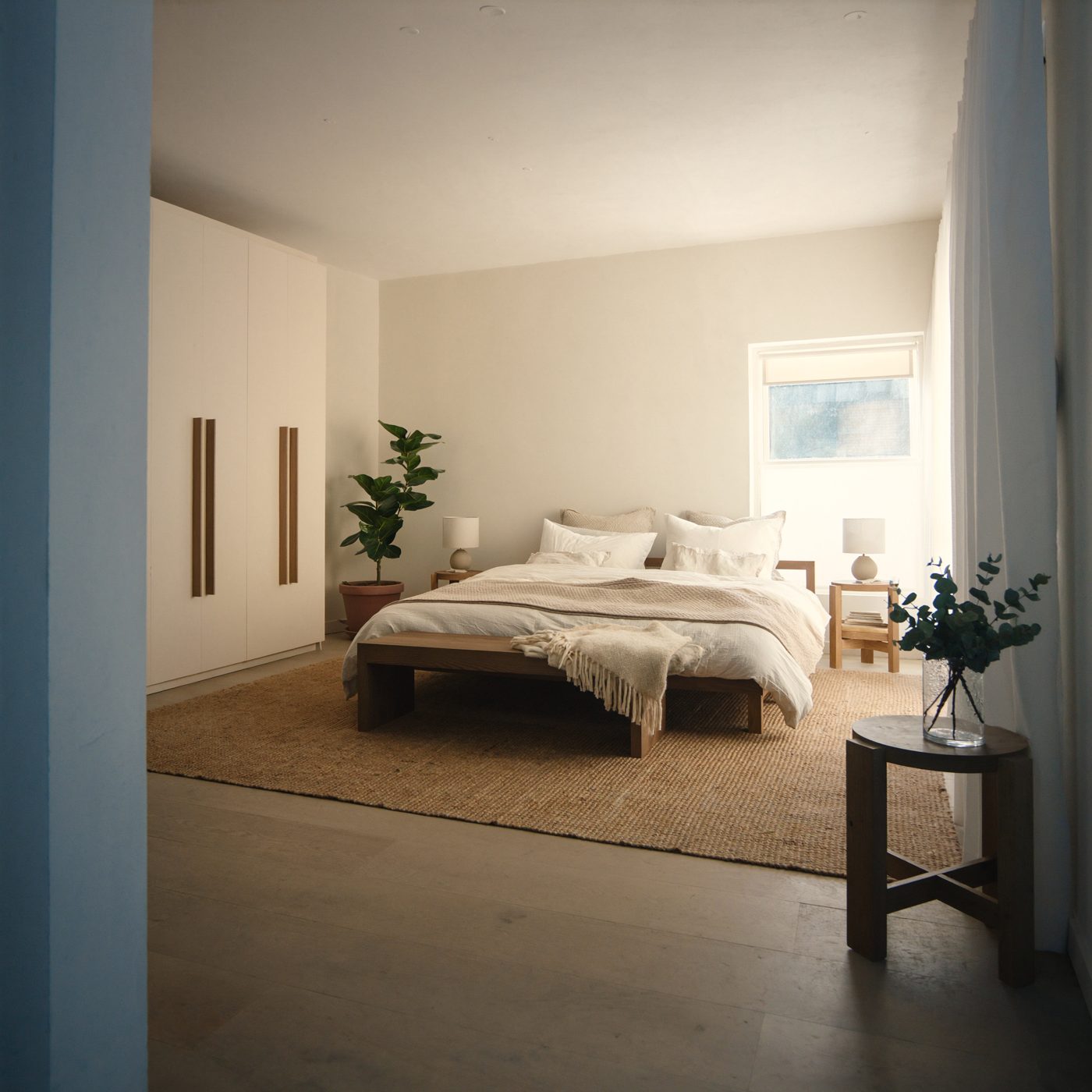 Rendered bedroom with double bed and built-in wardrobe